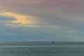 A lone boat at sea or ocean technically Royalty Free Stock Photo