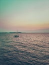 The Lone Sailboat Heading out to Sea Royalty Free Stock Photo