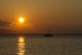 Sailboat sihlouetted at sunset on Maui. Royalty Free Stock Photo