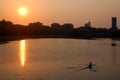 A lone sculler at sunrise Royalty Free Stock Photo