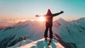 Lone single one skier standing at the peak of snowy mountain, on sunset