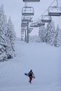 Lone snow boarder