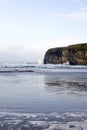 Lone surfer surfing the winter waves