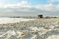 A lone tent on the shore