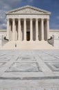 Lone tourist on the steps of the U.S. Supreme Court building in Washington, D.C. Royalty Free Stock Photo