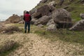 Lone traveler in rocky terrain