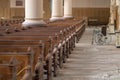 Wheelchair in abandoned cathedral