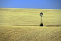 Lone Windmill in wheat field, Eastern Washington Royalty Free Stock Photo