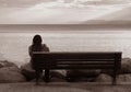 Lone woman on the bench. Royalty Free Stock Photo