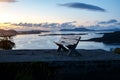 A lone wooden bench stands on top of a mountain. Royalty Free Stock Photo