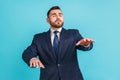 Loneless and blindness. Portrait of lost worry bearded young adult man in dark suit standing with