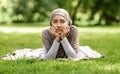 Upset muslim girl spending time at park, feeling lonely