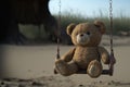 Lonely abandoned old teddy bear on swing with rusty chains Royalty Free Stock Photo