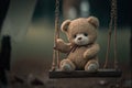Lonely abandoned old teddy bear on swing with rusty chains Royalty Free Stock Photo