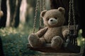 Lonely abandoned old teddy bear on swing with rusty chains