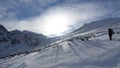 Lonely anonymous hiker on the snowy slope, Tatra Mountains, Poland Royalty Free Stock Photo