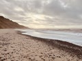 Lonely beach with cliff