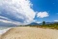 Lonely beach next to mountains