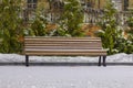 Lonely bench covered with snow at night Royalty Free Stock Photo