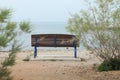 lonely bench on the beach