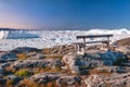 The lonely bench on the hiking trail to Sermermiut, Greenland Royalty Free Stock Photo