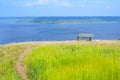 A lonely bench on a mountain with a beautiful view of the Volga River. A place for solitude, meditation, rethinking the meaning of