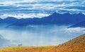 Lonely bench on mountain top Royalty Free Stock Photo