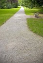 Lonely bench in a park Royalty Free Stock Photo
