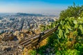 a lonely bench provides an aerial view of athens at the top of lycabetus hill...IMAGE
