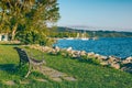 Lonely bench on sea coast Royalty Free Stock Photo