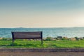 Lonely bench on sea coast