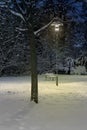 Lonely bench in a winter park Royalty Free Stock Photo