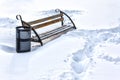 Lonely bench in winter snow covered park Royalty Free Stock Photo