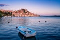 Lonely boat at the background of the old town of Shibenik, Croatia Royalty Free Stock Photo