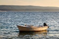 Lonely Boat and Island Brac at Sunset, Dalmatia Royalty Free Stock Photo