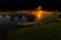 Lonely boat on lake with fog Royalty Free Stock Photo