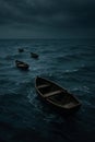 Lonely boats in a dark, stormy ocean. Royalty Free Stock Photo