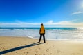 Lonely boy standing at the beach Royalty Free Stock Photo