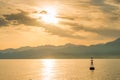 Lonely buoy lighthouse in the sea against the backdrop Royalty Free Stock Photo