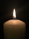 Lonely candle in the dark Royalty Free Stock Photo