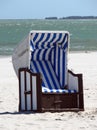 Lonely canopied beach chair 01