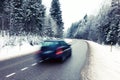 Lonely car on the road in winter landscape Royalty Free Stock Photo