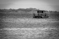 Lonely catamaran boat anchored on the sea Royalty Free Stock Photo