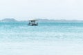 Lonely catamaran boat anchored on the sea Royalty Free Stock Photo
