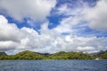 Lonely catamaran in the turquoise lagoon on the Tahaa island Royalty Free Stock Photo