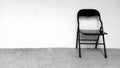 lonely chair photograph black white wall