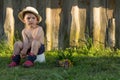 Lonely Child with Flowers. Summer Concept