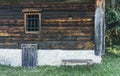 A lonely cottage in the misty and foggy forest just after the storm. Photograph was taken at Corvara in Dolomites mountain range, Royalty Free Stock Photo