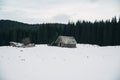 A lonely cottage in the misty and foggy forest just after the storm. Photograph was taken at Corvara in Dolomites mountain range, Royalty Free Stock Photo