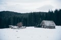 A lonely cottage in the misty and foggy forest just after the storm. Photograph was taken at Corvara in Dolomites mountain range, Royalty Free Stock Photo